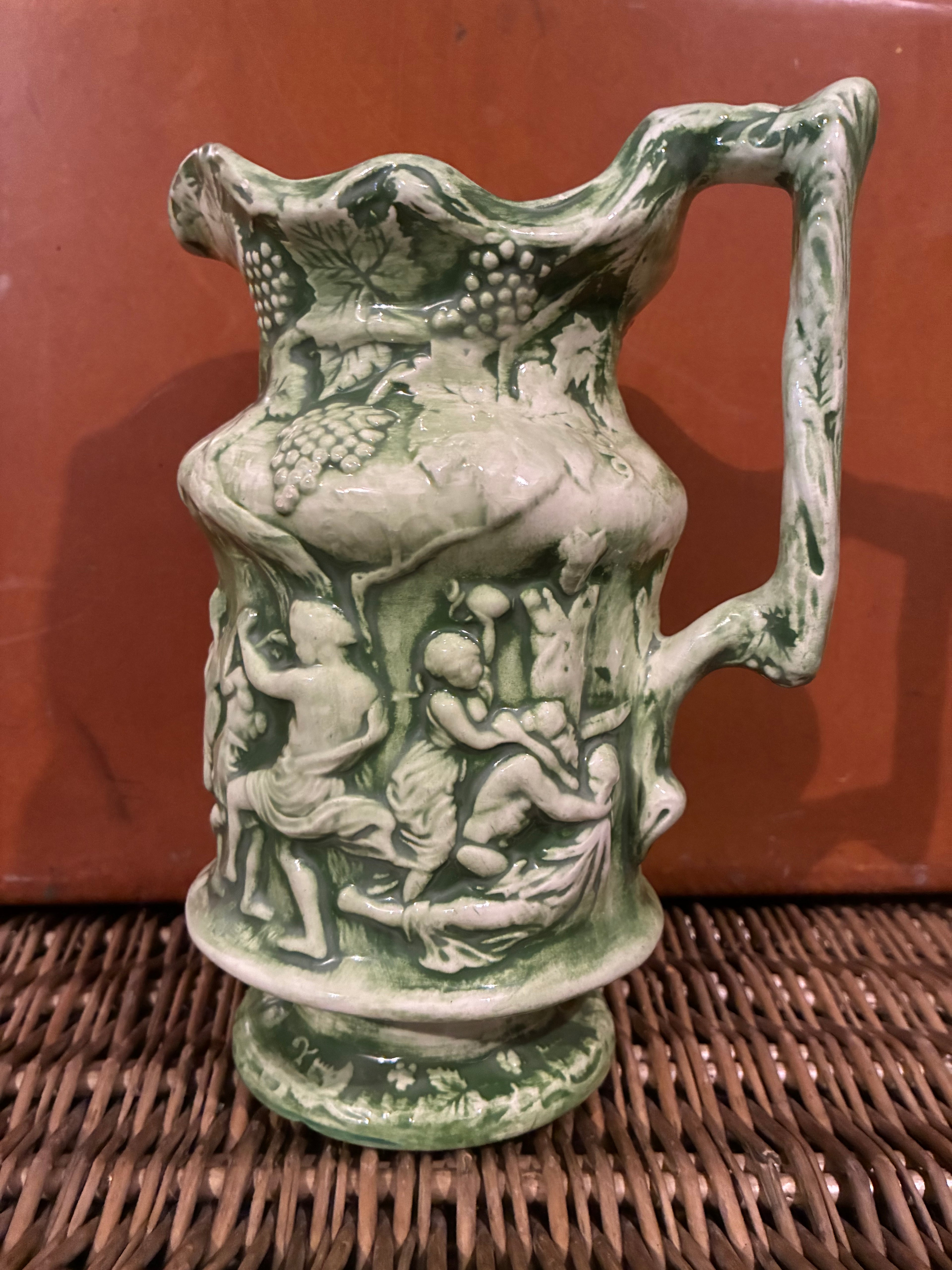 bacchanalian pitcher
water pitcher
pitcher
antique pitcher
bacchanalian